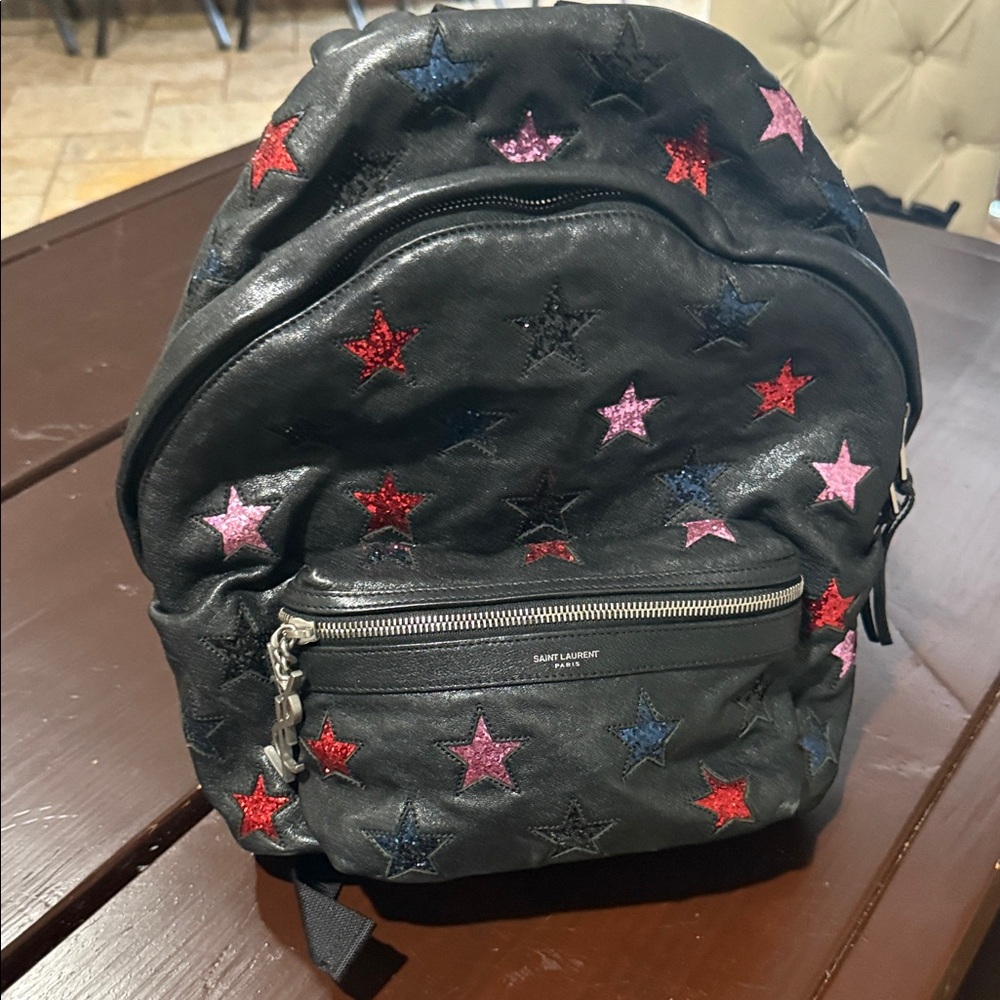 Saint Laurent Black Backpack with Colorful Star Embellishments